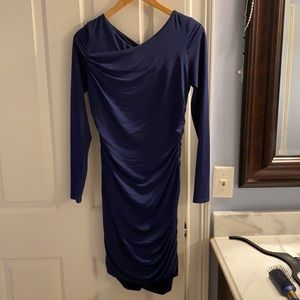 Elegant long sleeve dress with gold zipper on the back